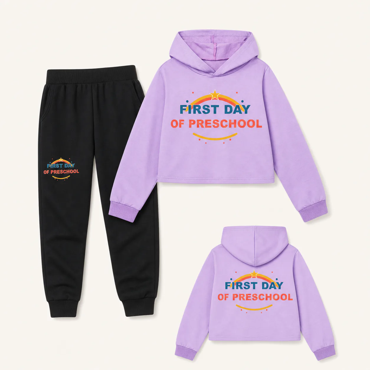 Lavender cropped hoodie and black jogger set with preschool prints on the hoodie front, upper back, and wearer-left pant leg