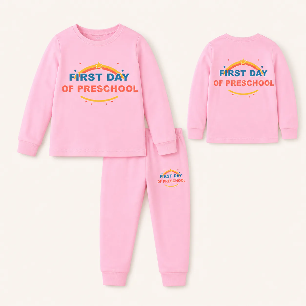 Light-pink long-sleeve pajama set with preschool prints on the top front, upper back, and wearer-left pant leg