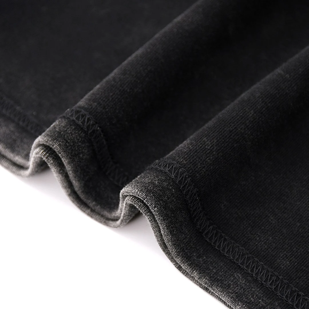 Cropped raglan crew-neck tee · 25008 · Black · Base garment photograph