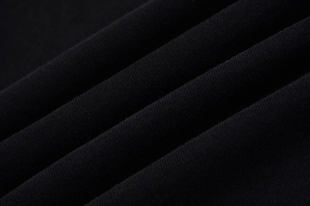 Relaxed distressed crew-neck tee · KFMT-11 · Snow black · Base garment photograph