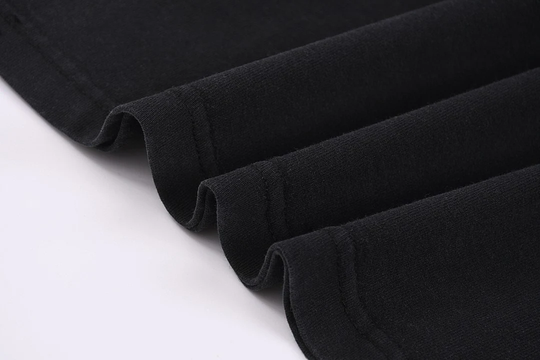 Relaxed distressed crew-neck tee · KFMT-11 · Snow black · Base garment photograph