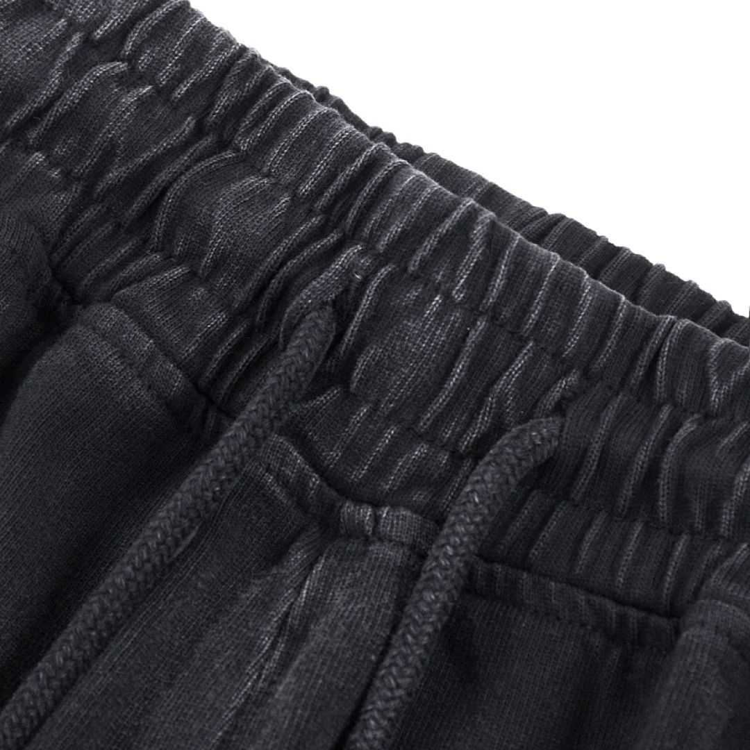 Snow-wash relaxed drawstring shorts · WK-04 · Black · Base garment photograph