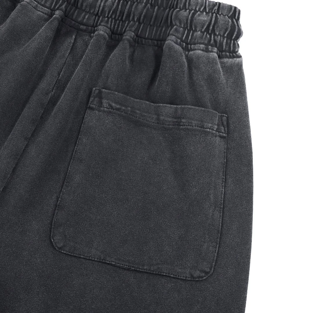 Snow-wash relaxed drawstring shorts · WK-04 · Black · Base garment photograph