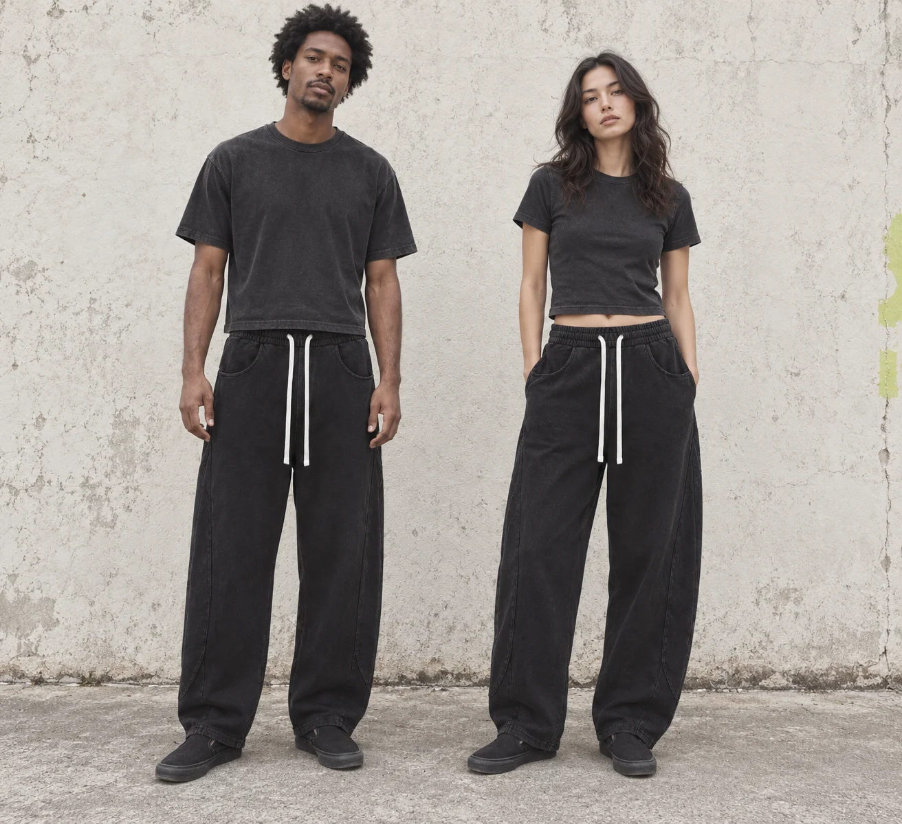 Washed curved-leg drawstring trousers · Unisex styling